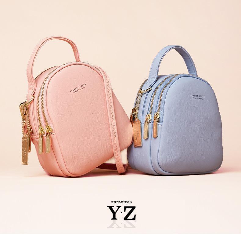 Bold and elegant, the Macaron Collection is one of our favorites. Made with soft, smooth faux-leather, it features a modern, versatile design that styles up any outfit with effortless elegance. The luxurious golden zippers and tags create a stunning accent against the classy body. Spacious and practical in its design, this cross-body strapped shoulder bag is perfect for carrying your essentials as you head out for an evening filled with fun, excitement, and adventure.