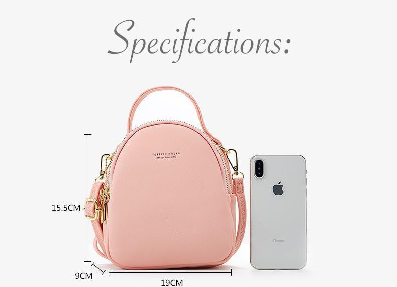 Bold and elegant, the Macaron Collection is one of our favorites. Made with soft, smooth faux-leather, it features a modern, versatile design that styles up any outfit with effortless elegance. The luxurious golden zippers and tags create a stunning accent against the classy body. Spacious and practical in its design, this cross-body strapped shoulder bag is perfect for carrying your essentials as you head out for an evening filled with fun, excitement, and adventure.