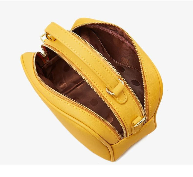 . Inside, we find two equally large pockets in the handbag that offer very good space for everything one would need for an important and charming occasion. Thanks to its soft fabric inside the pockets, the luxury feel continues on almost every corner of this charming handbag. 